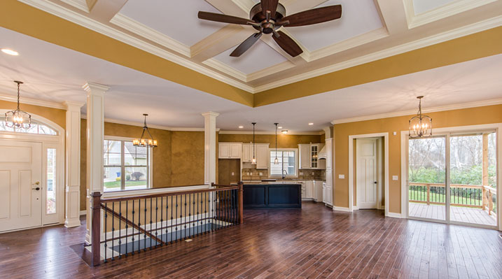 ICH Builders Linworth Worthington residence custom build main interior with kitchen, ceiling fan and wooden floors