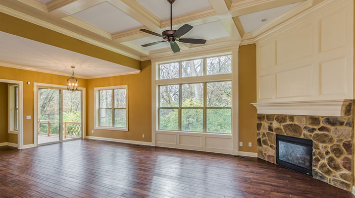 ICH Builders Linworth Worthington residence custom build showing fireplace and ceiling fan on main floor