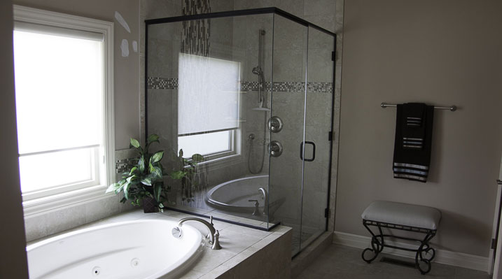 ICH Builders New Albany Ohio residence custom build bathroom with modern glass shower enclosure