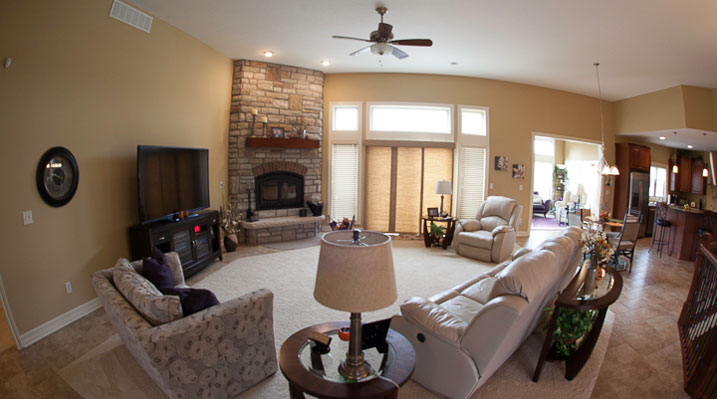 ICH Builders New Albany Ohio residence custom build main living area with natural stone fireplace