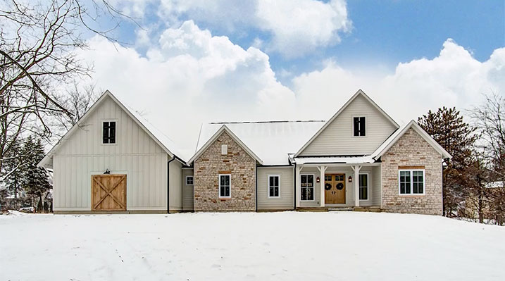 slider image of Dublin Ohio residence custom build house in winter