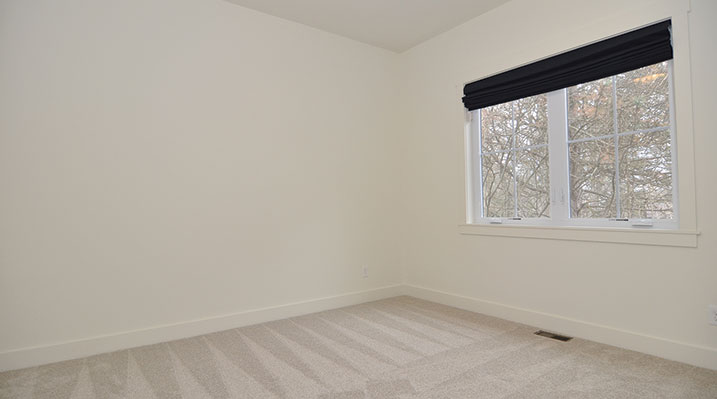 ICH Builders Dublin Ohio residence custom build bedroom with dual-pane window