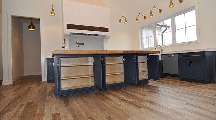 ICH Builders Dublin Ohio residence custom build close up of kitchen island revealing the underneath storage