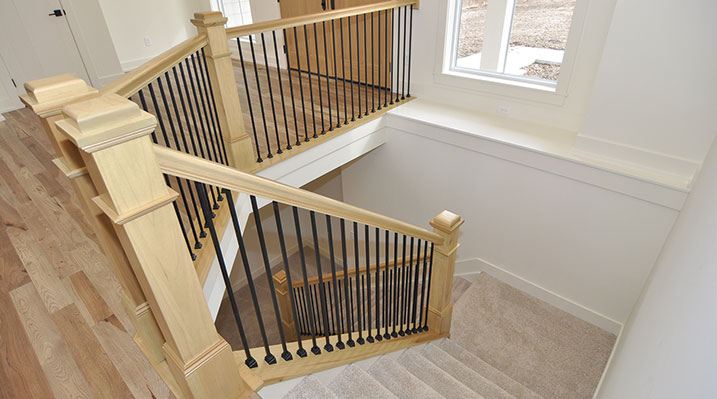 ICH Builders Dublin Ohio residence custom build showing carpeted stairs going down towards the basement area