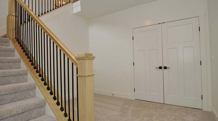 ICH Builders Dublin Ohio residence custom build carpeted basement area