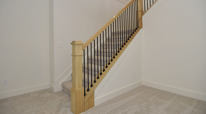 ICH Builders Dublin Ohio residence custom build showing stairs in the basement area