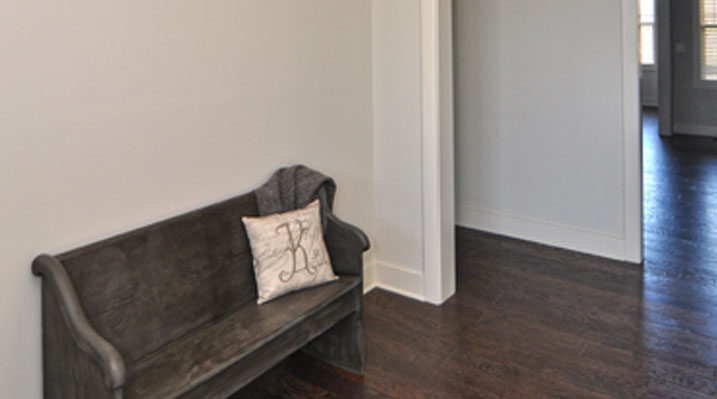slider image of Berlin Ohio residence custom build showing farmhouse-style entryway bench
