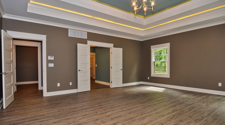 Iulianelli Custom Homes Lithopolis Ohio residence custom build another view of the master bedroom showing the doors leading to the attached bathroom and hallway