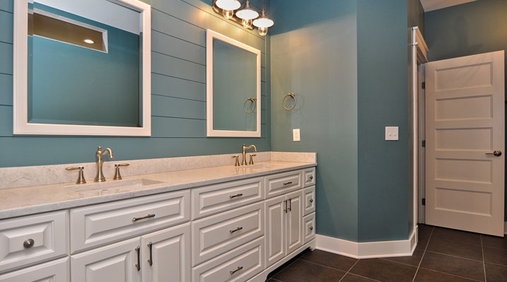 Iulianelli Custom Homes Lithopolis Ohio residence custom build master bedroom bathroom showing 2 sink vanity with white cabinets and gold fixtures