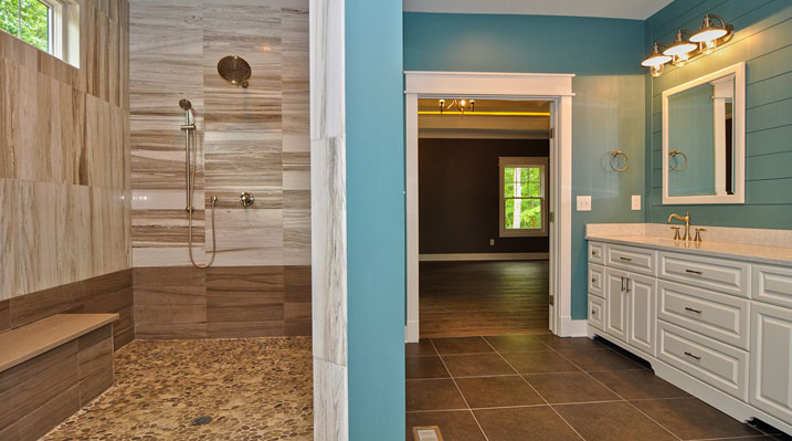 Iulianelli Custom Homes Lithopolis Ohio residence custom build master bathroom showing large stand up shower and white vanity with light blue walls