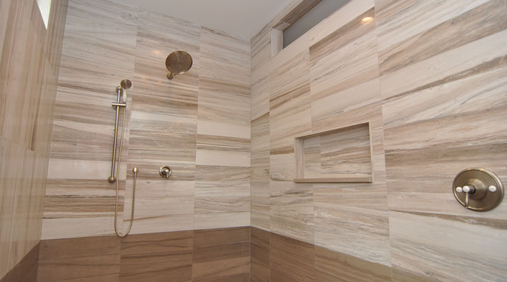 Iulianelli Custom Homes Lithopolis Ohio residence custom build another view of the master bathroom modern walk-in shower featuring wood-look tiles and gold fixtures