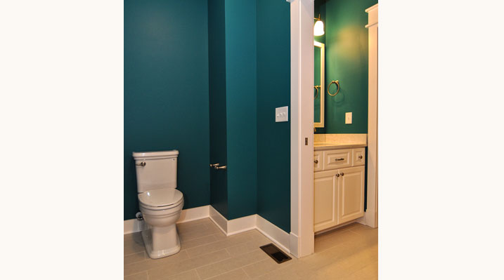 Iulianelli Custom Homes Lithopolis Ohio residence custom build another view of the second bathroom with dark blue walls, white trim and sand colored floor tiling