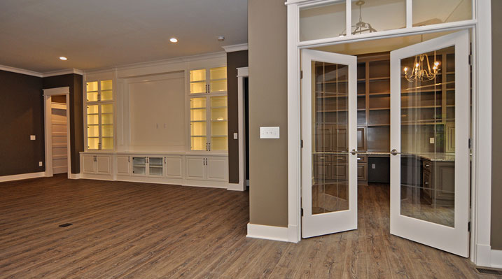 ICH Lithopolis Ohio residence custom in the main living space showing glass french doors that lead to the office