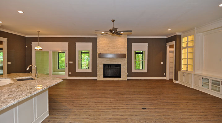 ICH Lithopolis Ohio residence custom build a view of the large living area looking towards the back of the house and the enclosed patio
