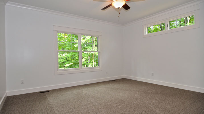 Iulianelli Custom Homes Lithopolis Ohio residence custom build empty room showing white walls and ceiling fan