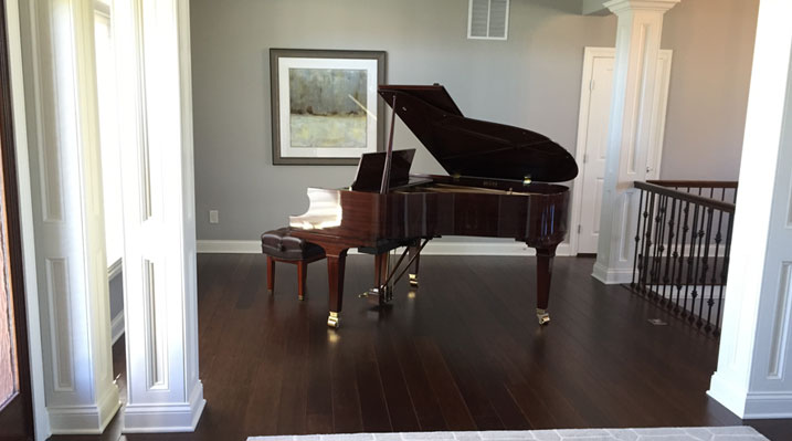 Iulianelli Custom Homes Hartford Model showing grand piano near front entrance