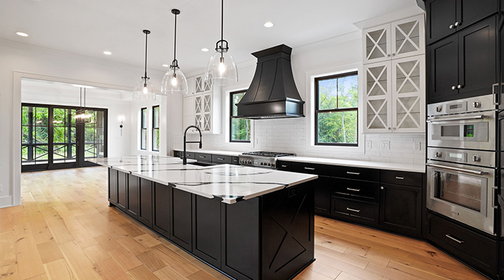 ICH Builders Canal Winchester Ohio residence custom build open kitchen looking towards the galley island and dining area in the background