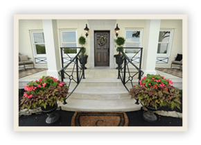 thumbnail image of Iulianelli Custom Homes Pickerington Model showing the front door entrance from outside and marble styled tiled front porch