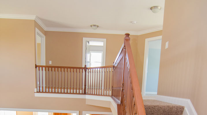 Iulianelli Custom Homes Oakland Model mezzanine before painting of walls and railings