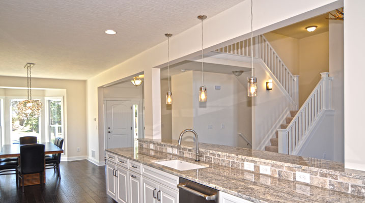 Iulianelli Custom Homes Oakland Model showing staircase view from the kitchen