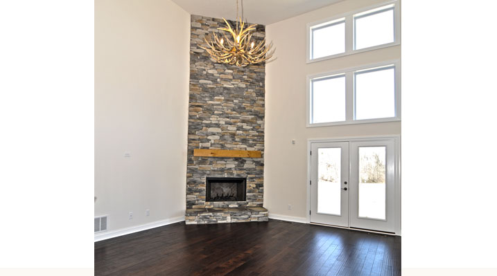 Iulianelli Custom Homes Oakland Model showing fireplace and rear doors