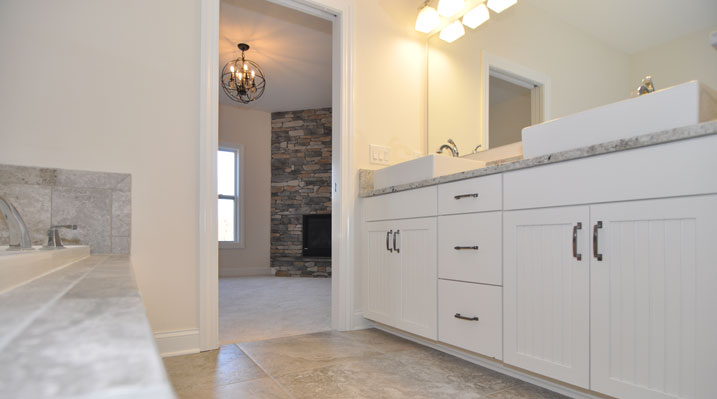 Iulianelli Custom Homes Oakland Model upstairs bedroom as seen from the bathroom