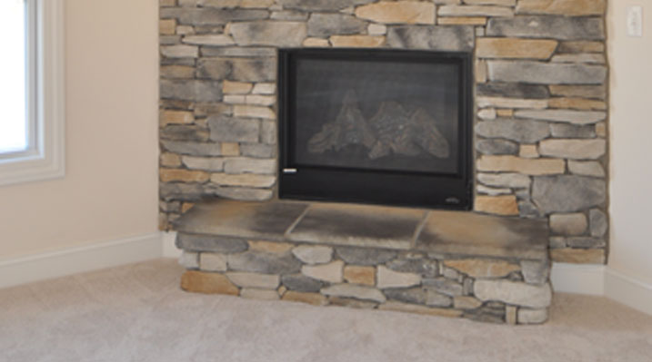 slider image of Oakland Model upstairs bedroom fireplace