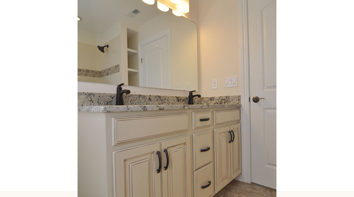 Iulianelli Custom Homes Oakland Model close up of bathroom vanity and handles