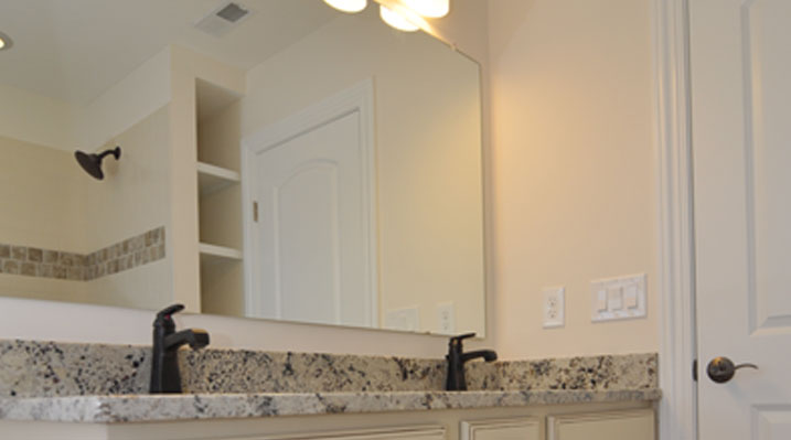 slider image of Oakland Model close up of bathroom vanity and handles
