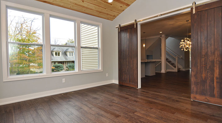 Iulianelli Custom Homes Kingsdale Model showingcasing the sliding barn doors